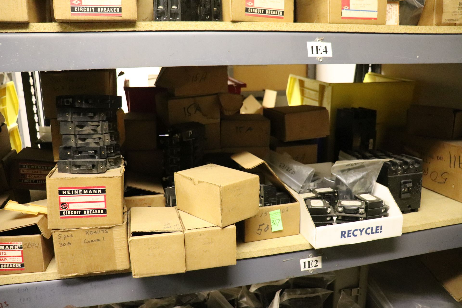 Shelf of miscellaneous circuit breakers, everything pictured