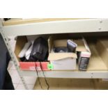 Miscellaneous remote control, Handy Stitch machine, and Polaroid camera