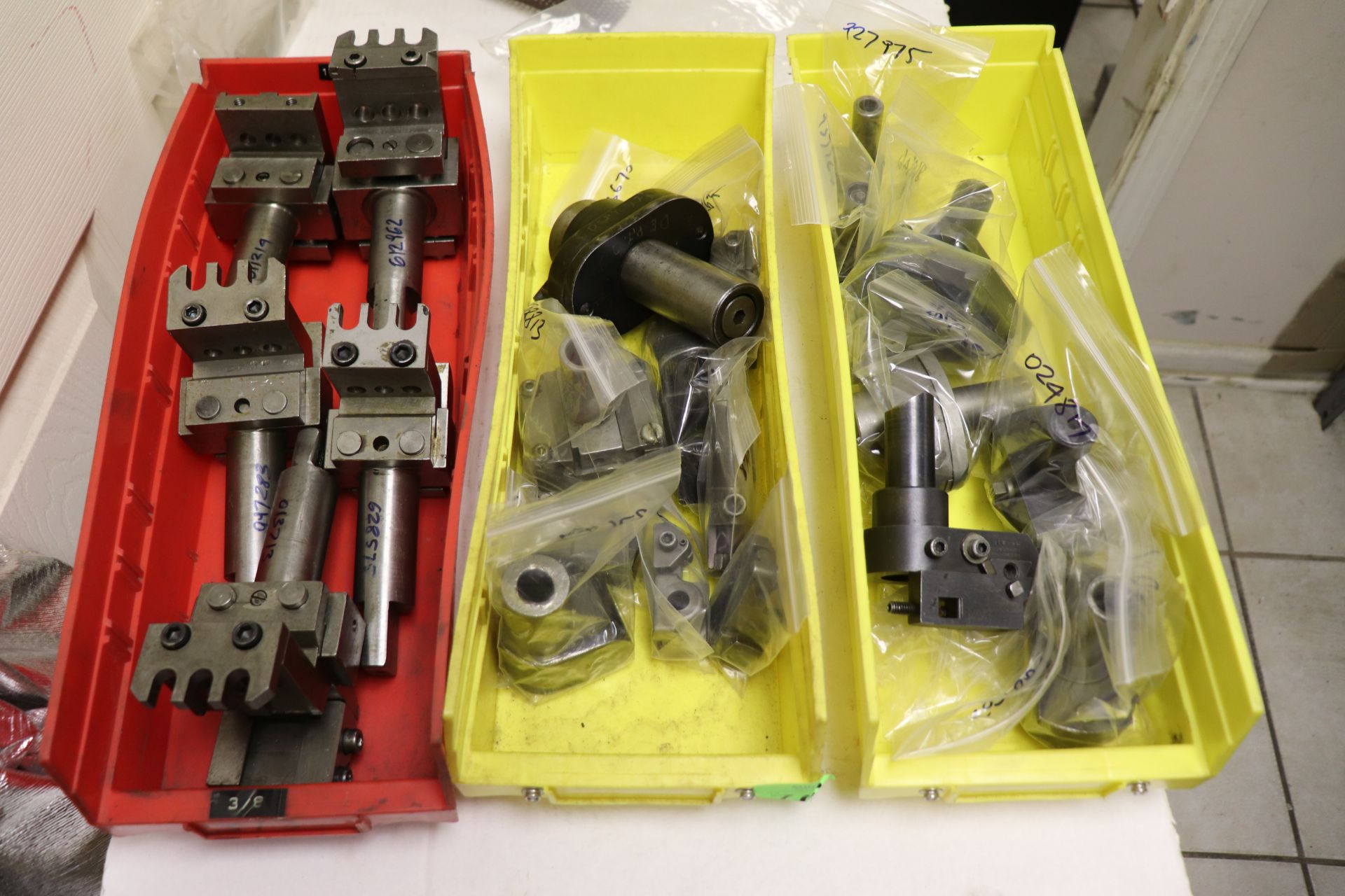 Three boxes of wire bending head tooling