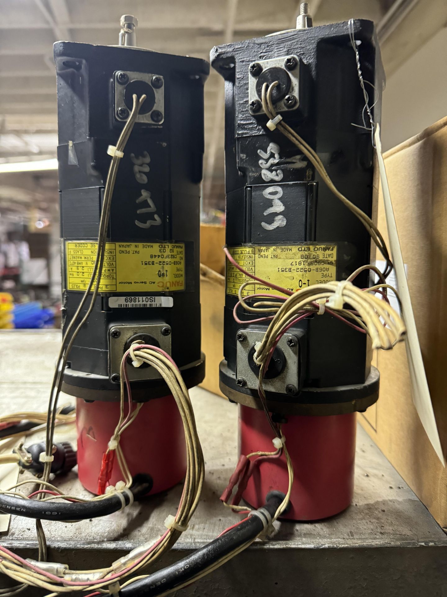 Two Fanuc AC Servo motors, model 1-0