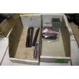 Two boxes of end mills and reamers