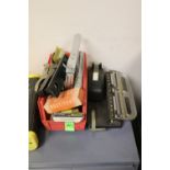 Office supplies including staplers and staples
