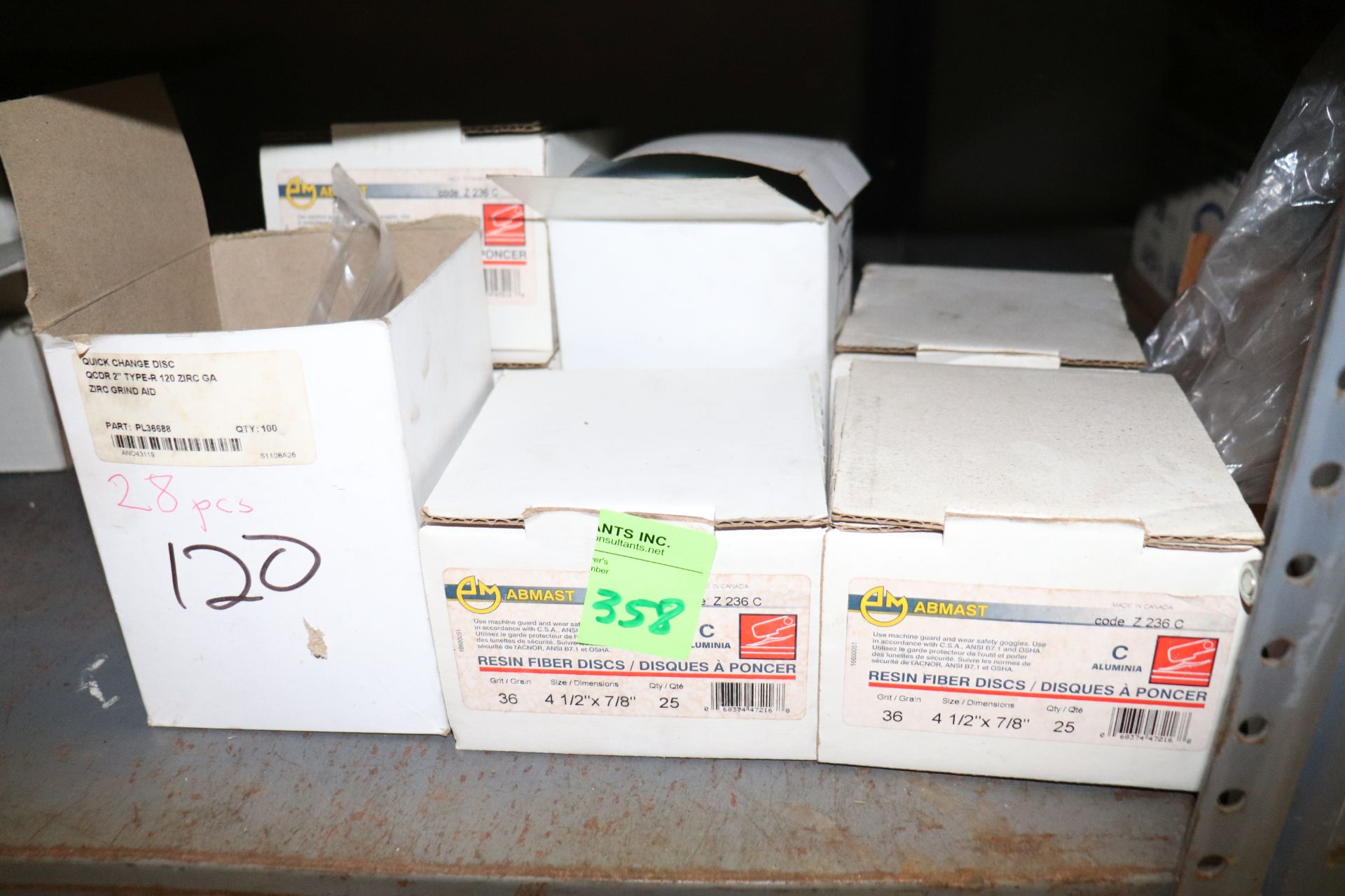 Seven boxes of Resin fiber discs, 4½", 36-grain, 2" Type R Grind Aids circles