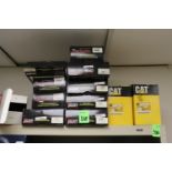 Top shelf of car parts including wire sets and Cat elements