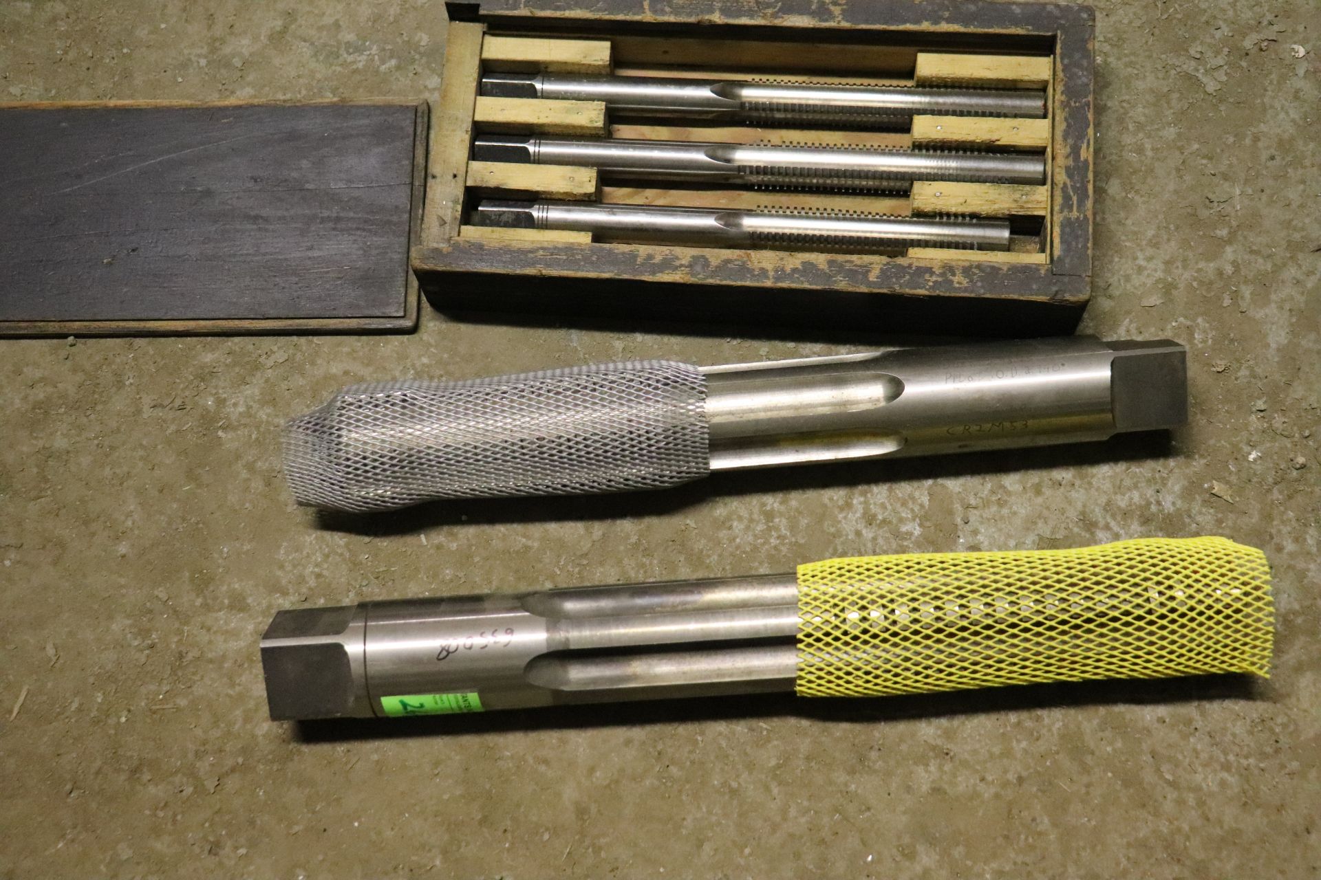 Set of three trapezoidal head taps: one 1/8-6 square and two 2¾"-3 Acme finish bores