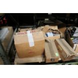 Pallet of small light bulbs, electrical components, circuit breakers, power bricks, and electric mot