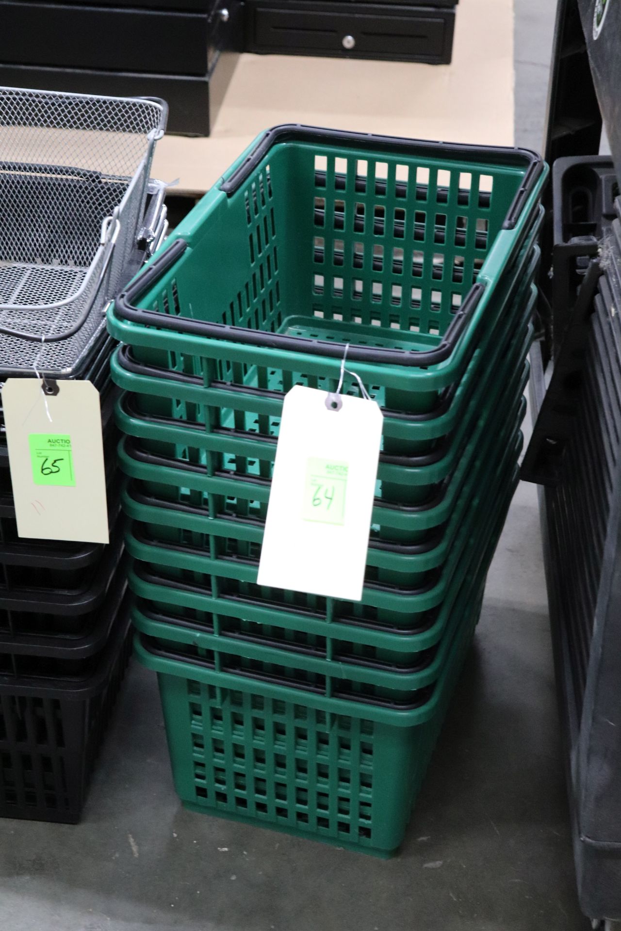 Nine plastic shopping baskets