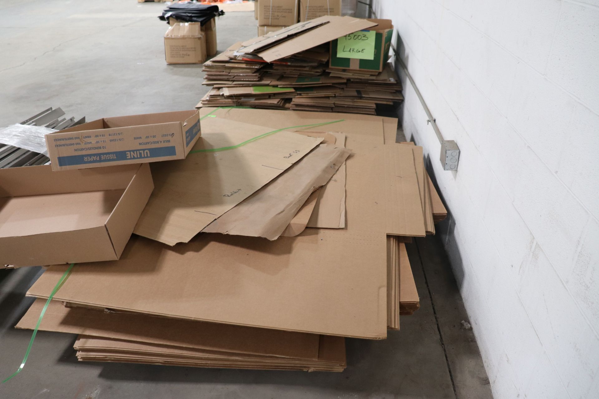 Partial pallet of cardboard boxes