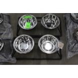 Two small Worthy Dog Company food and water bowl stands with stainless steel bowls