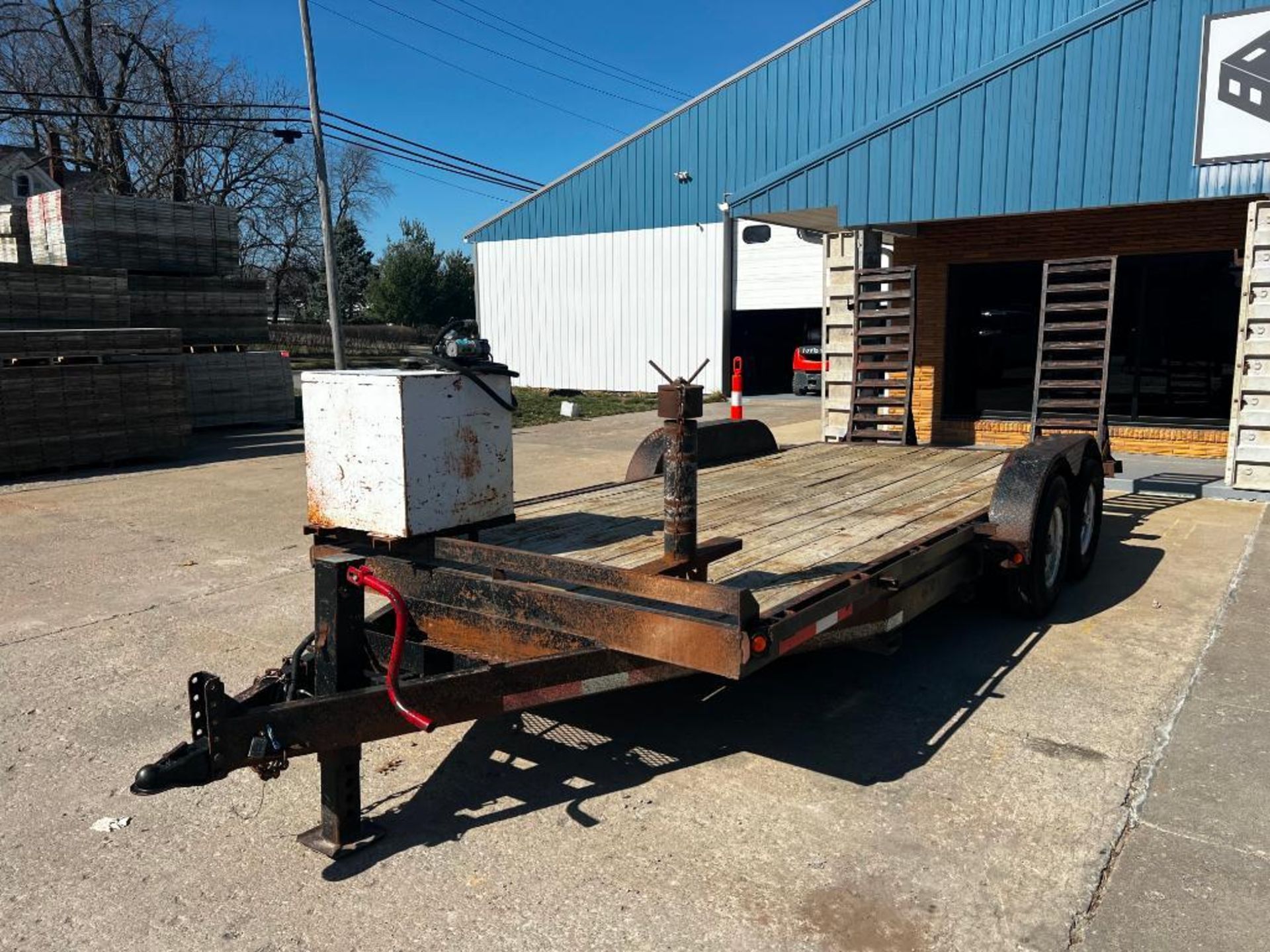 1999 R & W Trailer, 20' x 83", 8 bolt rims, fuel tank and pump, with ramps, fork pockets