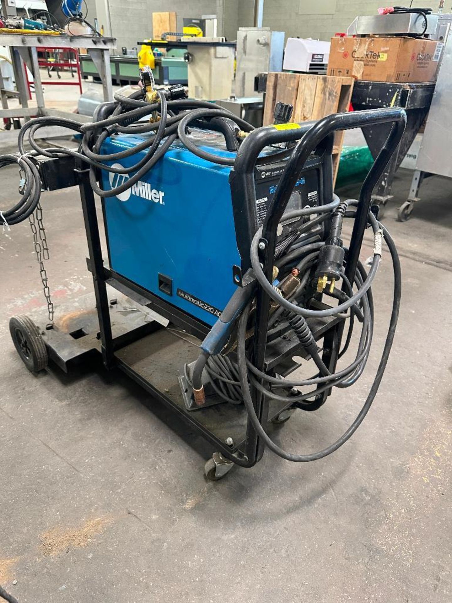 DESCRIPTION MILLER MULTIMATIC 220 AC/DC WELDER. ADDITIONAL INFORMATION W/ LEADS AND GUN LOCATION WAR - Image 2 of 8