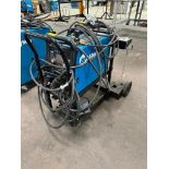 DESCRIPTION MILLER MULTIMATIC 220 AC/DC WELDER. ADDITIONAL INFORMATION W/ LEADS AND GUN LOCATION WAR