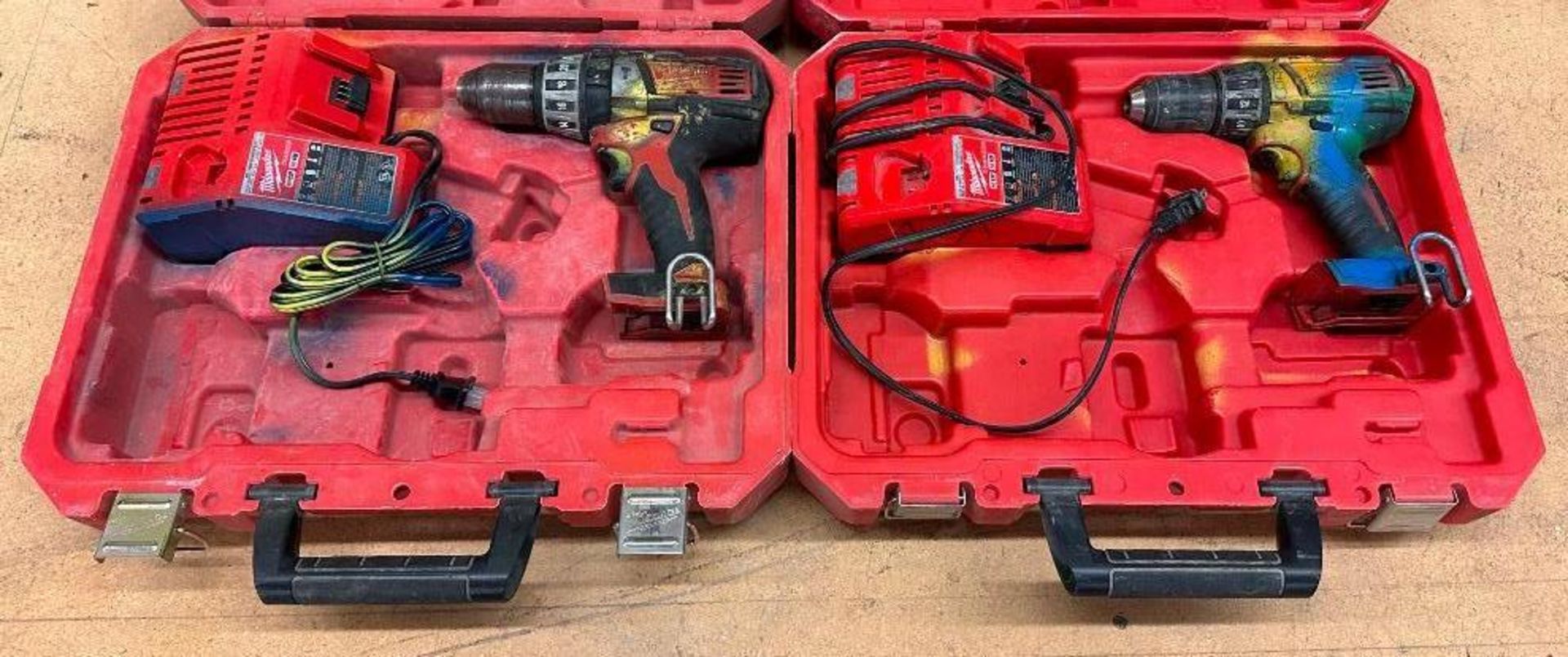 (2) CORDLESS DRILLS WITH CHARGERS AND CASES