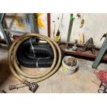 PUMP HOSE WITH ASSORTED TUBING AND MISC. ITEMS IN CORNER