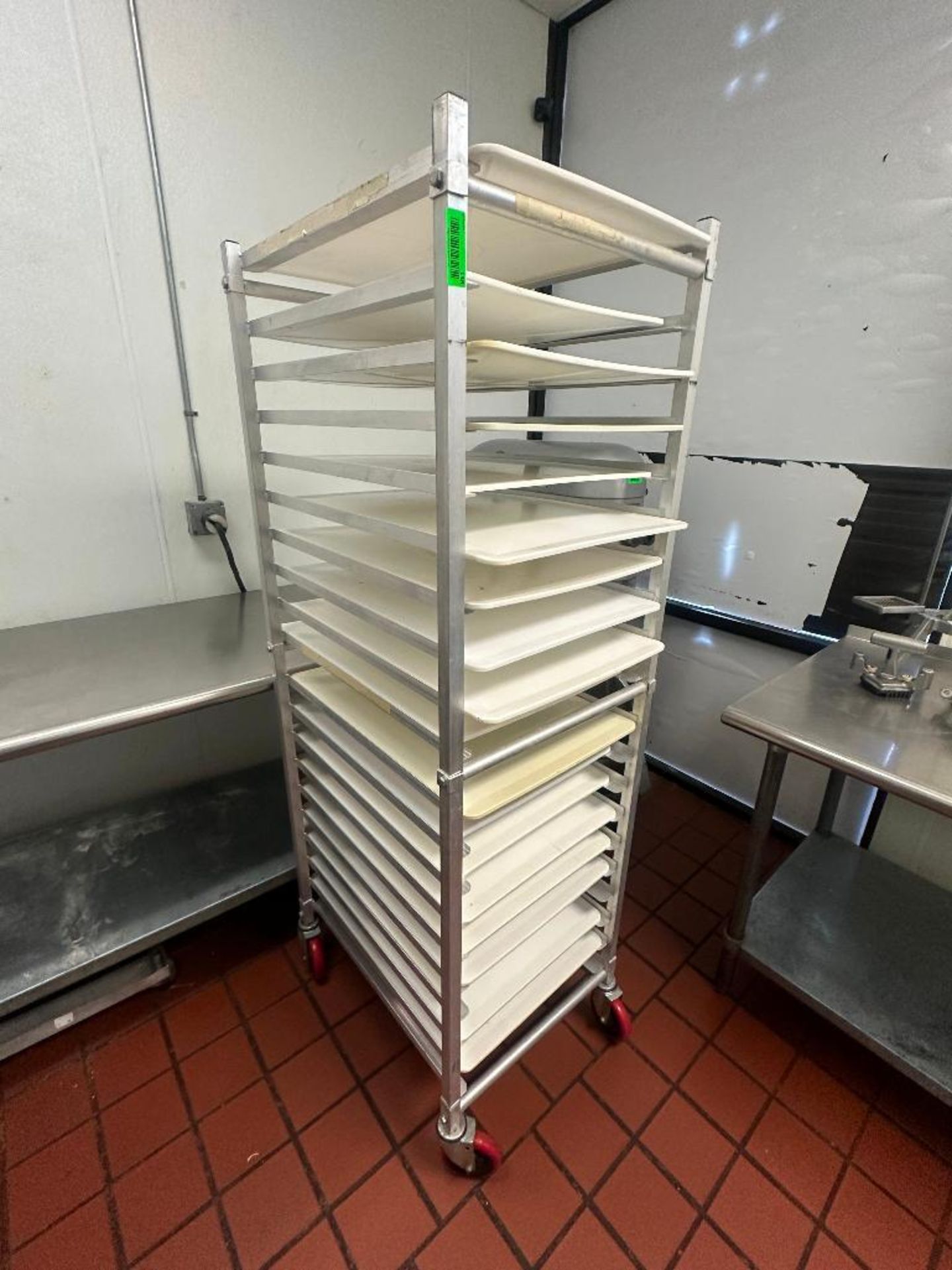 DESCRIPTION TWENTY PAN ROLL ABOUT TRAY RACK W/ CONTENTS - PLASTIC DOUGH BOARDS. LOCATION 7399 O'Conn