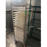 DESCRIPTION TWENTY PAN ROLL ABOUT TRAY RACK W/ CONTENTS - PLASTIC DOUGH BOARDS. LOCATION 7399 O'Conn