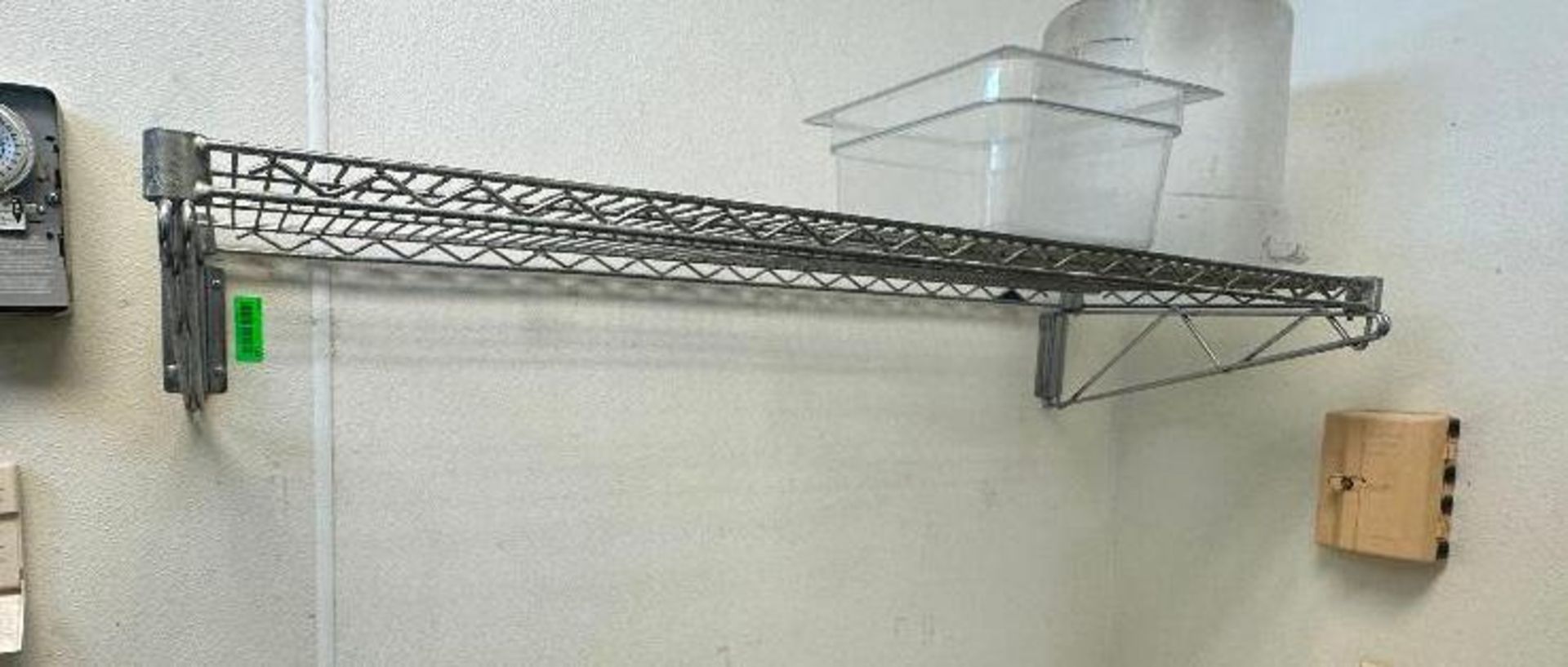 DESCRIPTION (3) 48" X 18" SECTION OF WIRE WALL MOUNTED SHELVES W/ BRACKETS THIS LOT IS: ONE MONEY LO