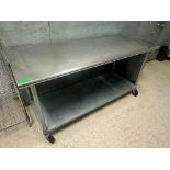 DESCRIPTION 72" X 30" STAINLESS TABLE W/ GALVANIZED UNDER SHELF. ADDITIONAL INFORMATION ON CASTERS S