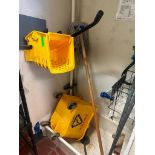 DESCRIPTION YELLOW MOP BUCKET AND WRINGER. ADDITIONAL INFORMATION W/ MOP LOCATION 7399 O'Connor Driv