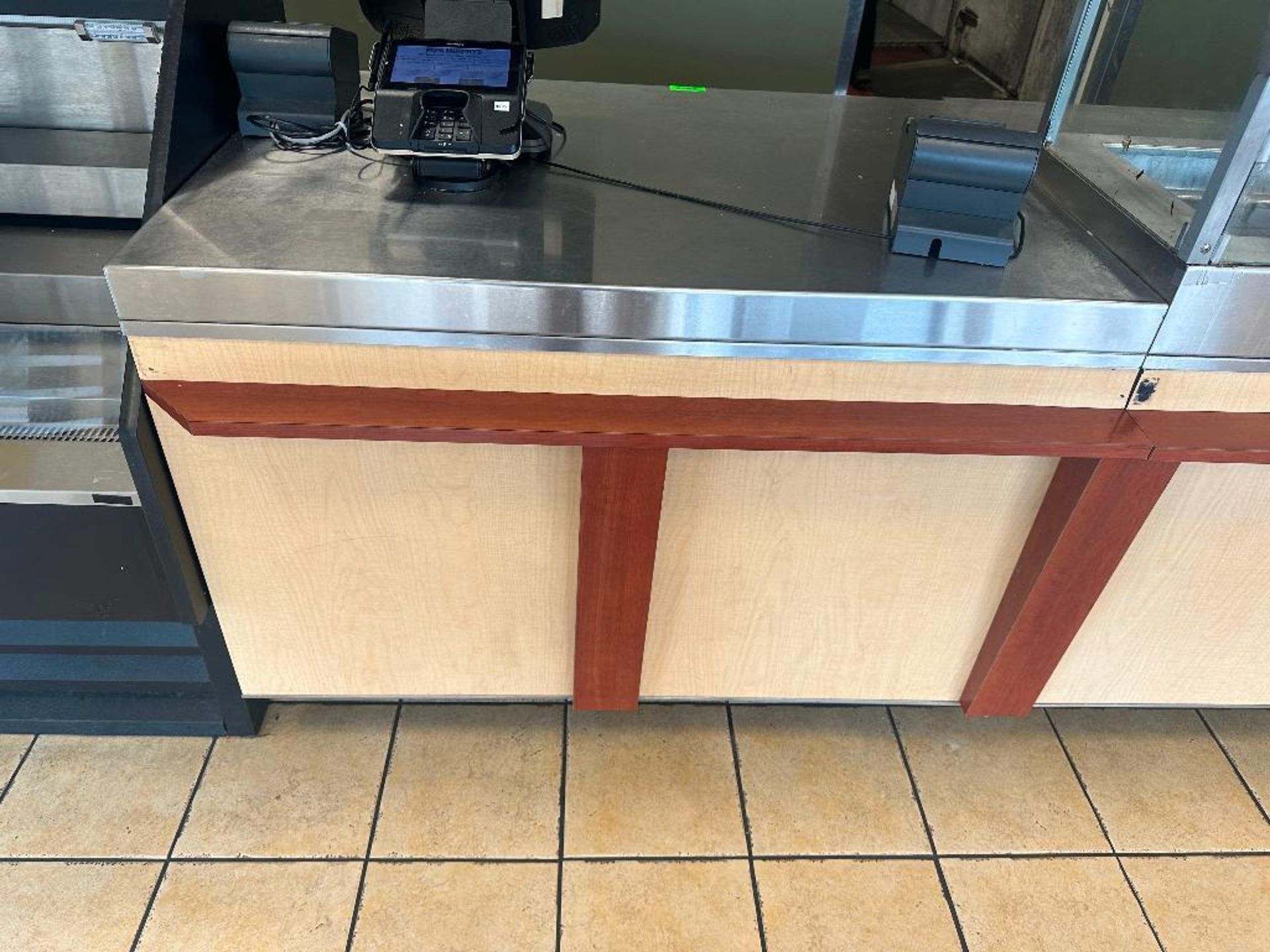 DESCRIPTION 14' OF STAINLESS SALES COUNTER, IN THREE SECTIONS. ADDITIONAL INFORMATION 6' CORNER SECT