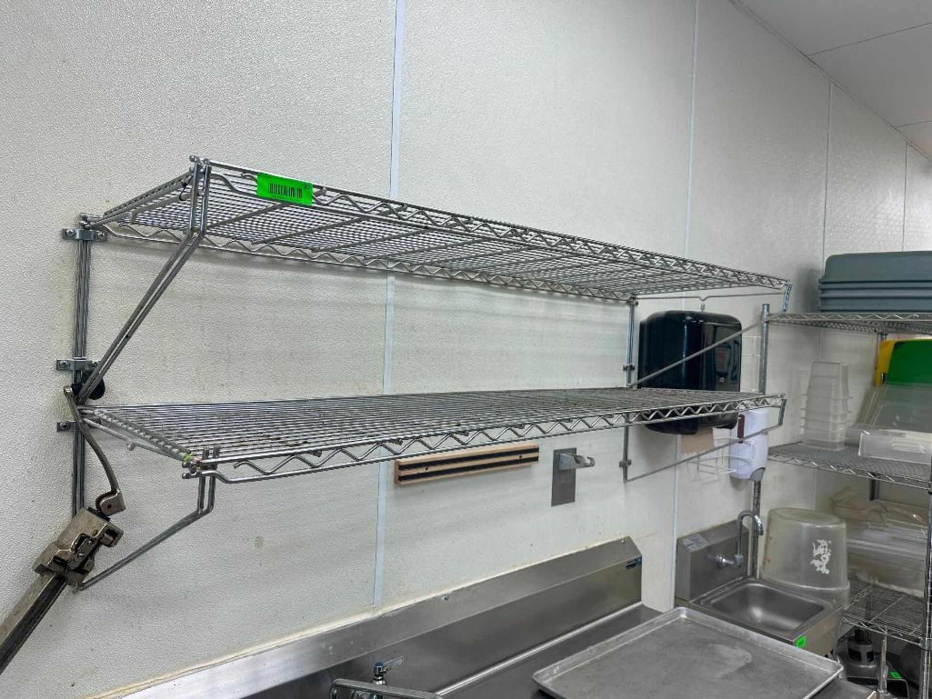 DESCRIPTION (3) 48" X 18" TWO TIER WALL MOUNTED WIRE SHELVING SECTIONS THIS LOT IS: SOLD BY THE PIEC