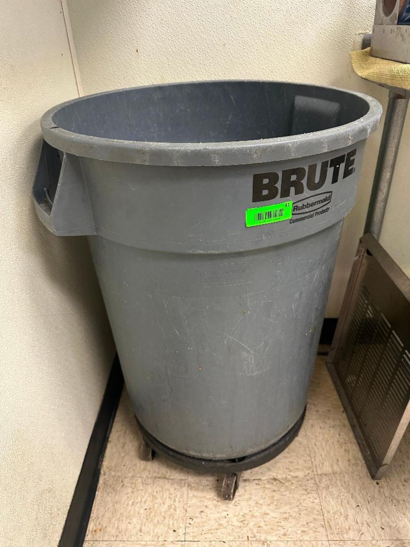 DESCRIPTION (2) BRUTE 44" GALLON TRASH CANS W/ DOLLYS BRAND / MODEL: RUBBERMAID THIS LOT IS: SOLD BY