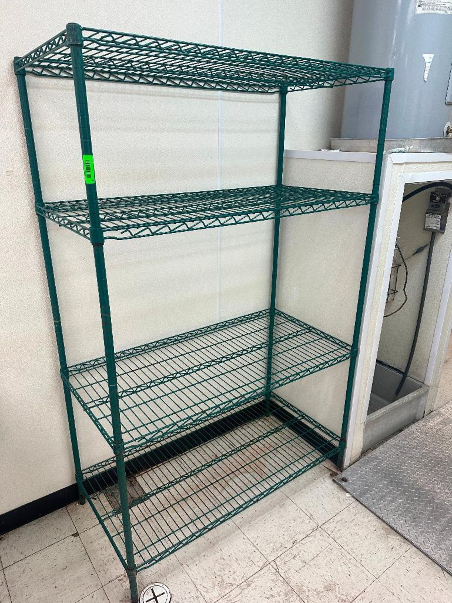 DESCRIPTION 48" X 24" FOUR TIER GREEN METRO SHELVING. SIZE 48" X 24" X 75" LOCATION 2110 W Slaughter