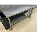 DESCRIPTION 72 "X 30" STAINLESS TABLE W/ GALVANIZED UNDER SHELF. ADDITIONAL INFORMATION ON CASTERS S