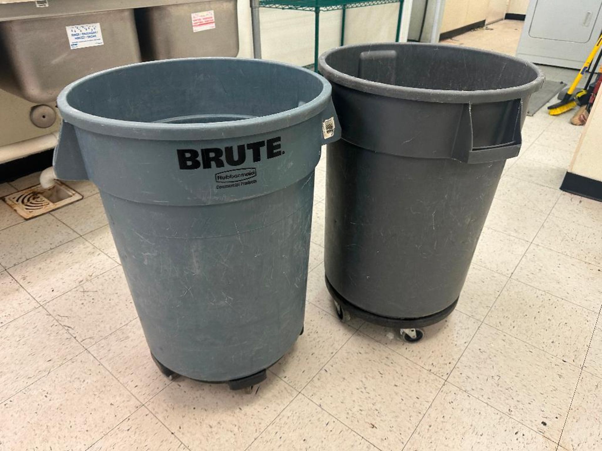 DESCRIPTION (2) 44 GALLON BRUTE TRASH CANS W/ DOLLYS BRAND / MODEL: RUBBERMAID THIS LOT IS: SOLD BY