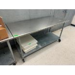 DESCRIPTION 72 "X 30" STAINLESS TABLE W/ GALVANIZED UNDER SHELF. ADDITIONAL INFORMATION ON CASTERS S