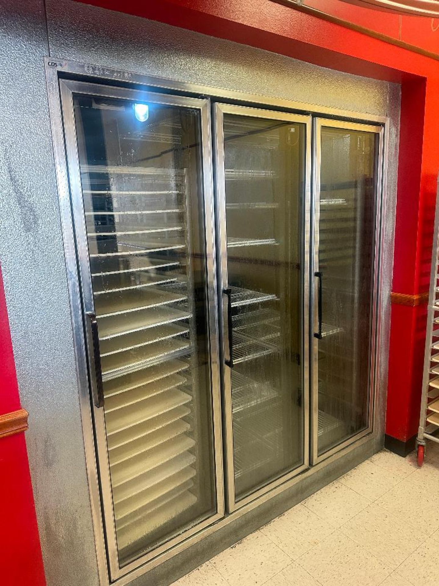 DESCRIPTION 19' X 10' WALK IN COOLER W/ THREE GLASS DOOR MERCHANDISER FRONT AND SIDE MAN DOOR. BRAND