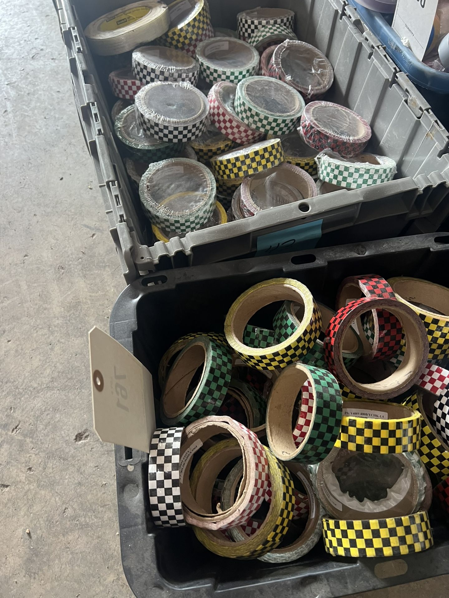 2 Totes of Checkered Electrical Tape