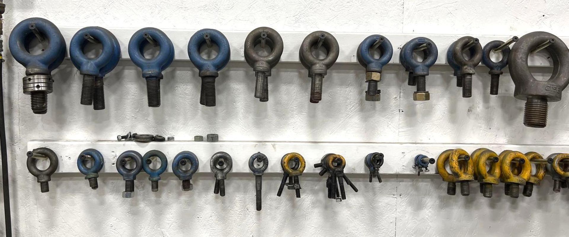 Lot of Assorted Eye Bolts, VariouSizes, Hanging on Wall - Image 5 of 5