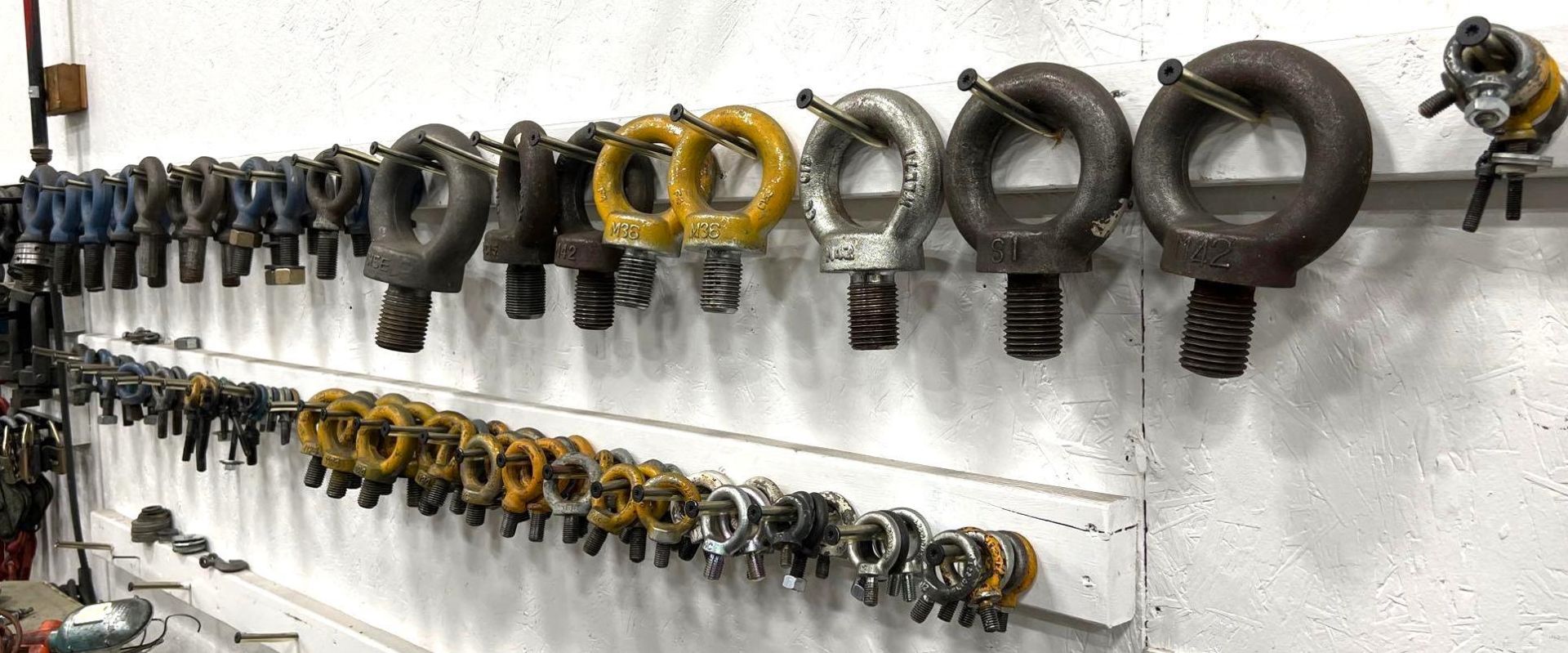 Lot of Assorted Eye Bolts, VariouSizes, Hanging on Wall - Image 3 of 5