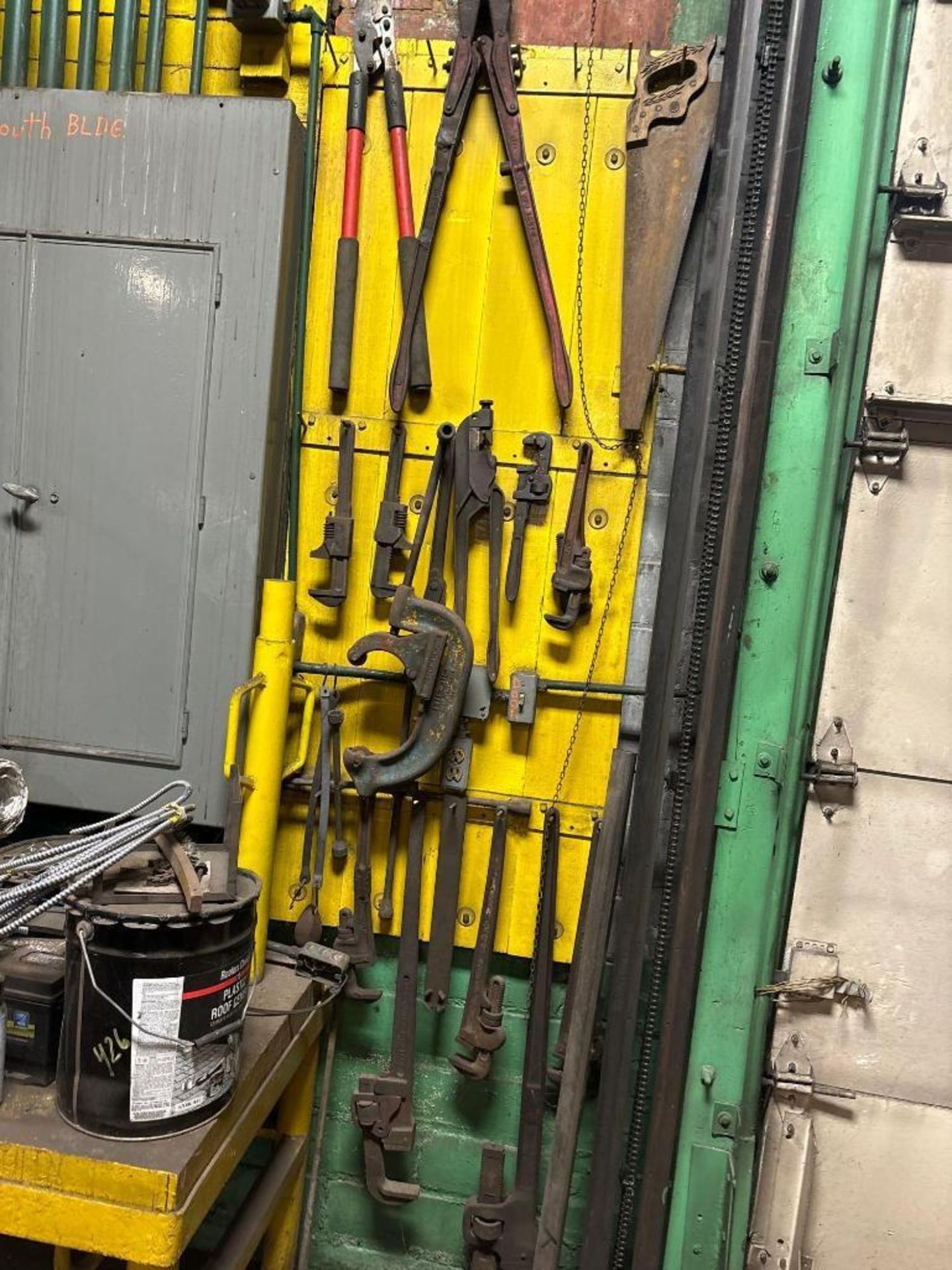 Wall of Pipe Cutters, Pipe Wrenches, and Bolt Cutters