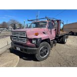 1986 Ford F-700 Diesel Flatbed Truck (located off-site, please read description)