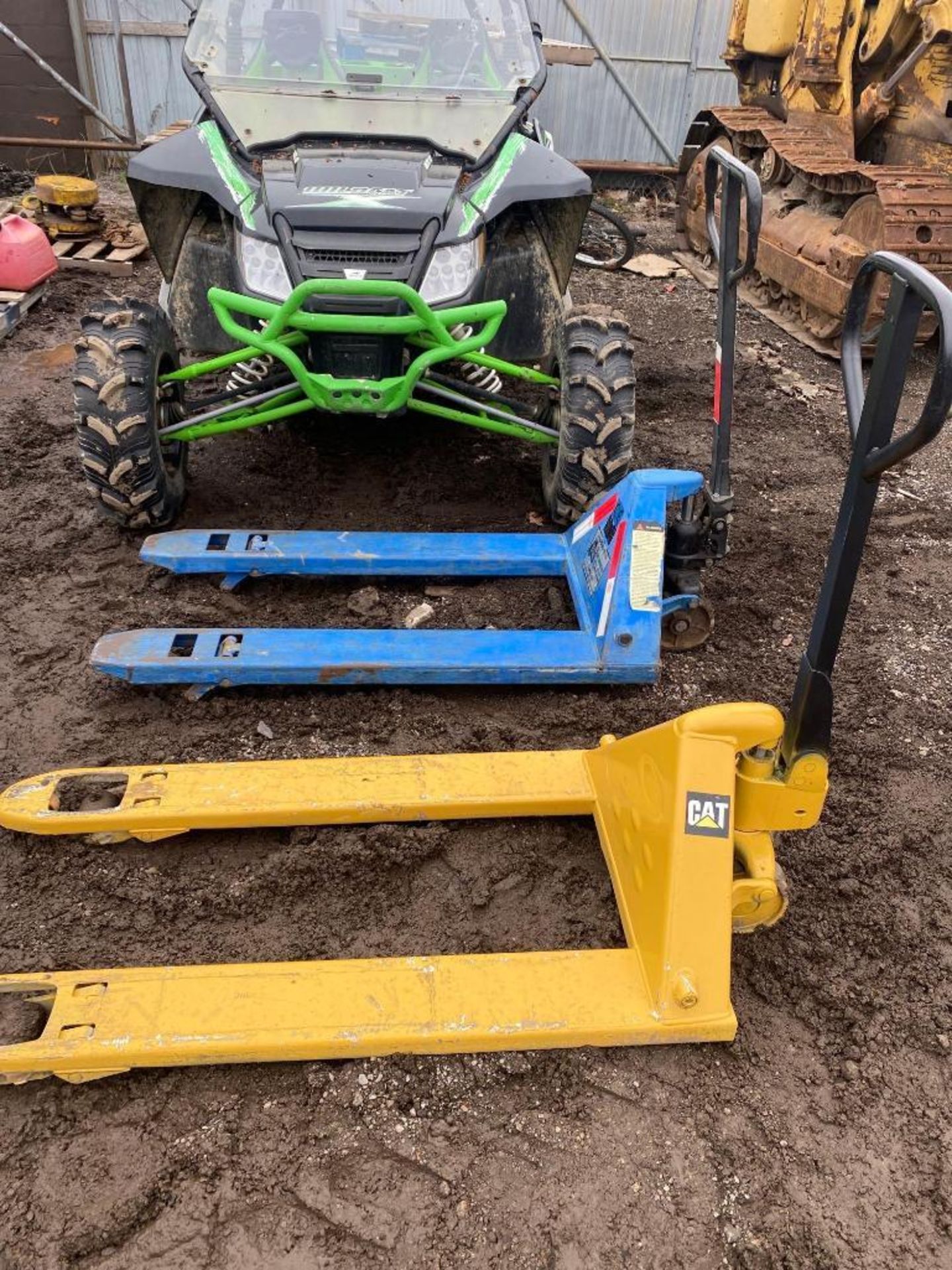 (2) Working Pallet Jacks