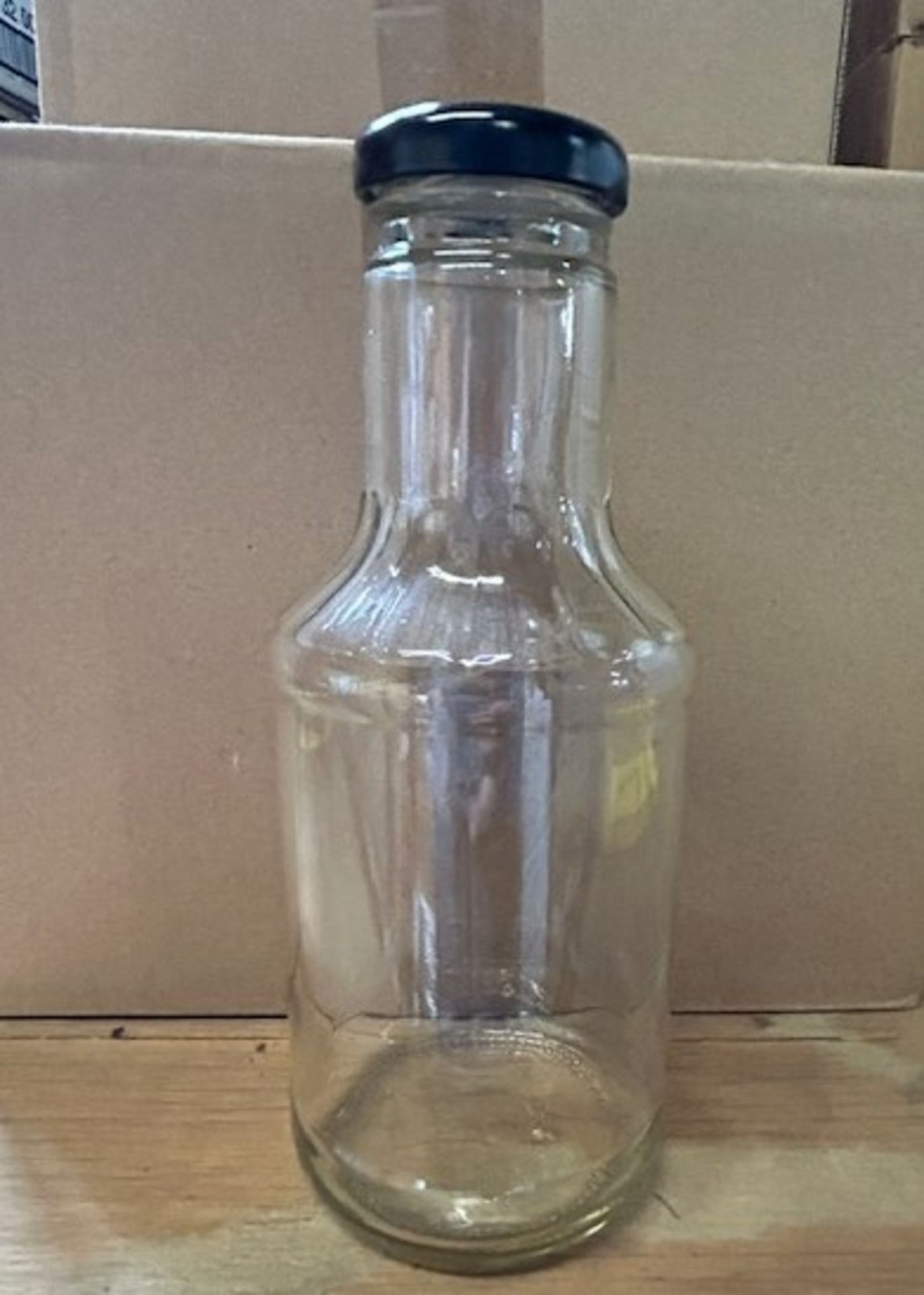 (47) 425 mL Glass Bottles with Top