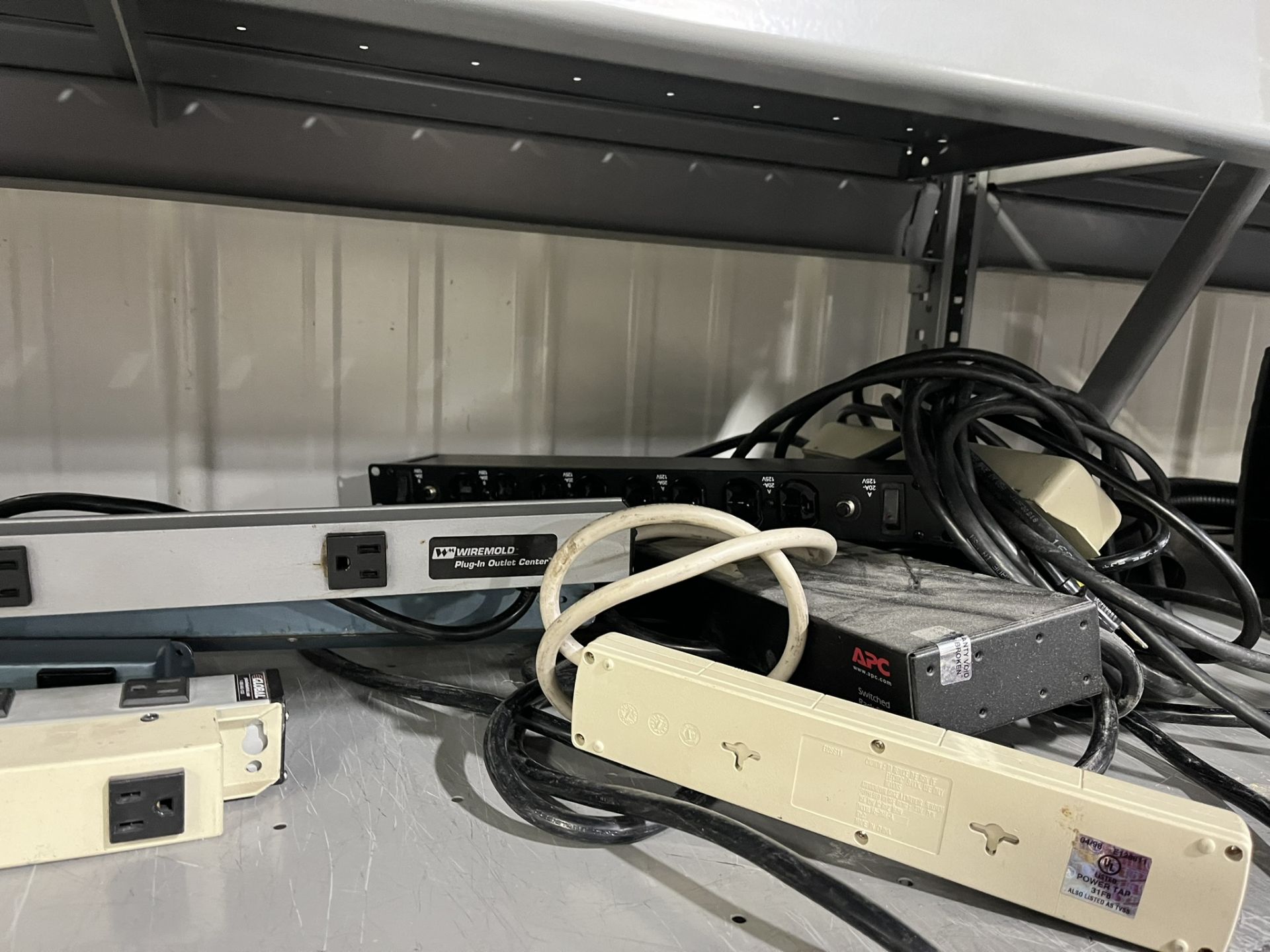 CONTENTS OF SHELF: POWER STRIPS; LAPTOP CHARGERS; ETHERNET SWITCHES (ZONES A&B1) - Image 2 of 2