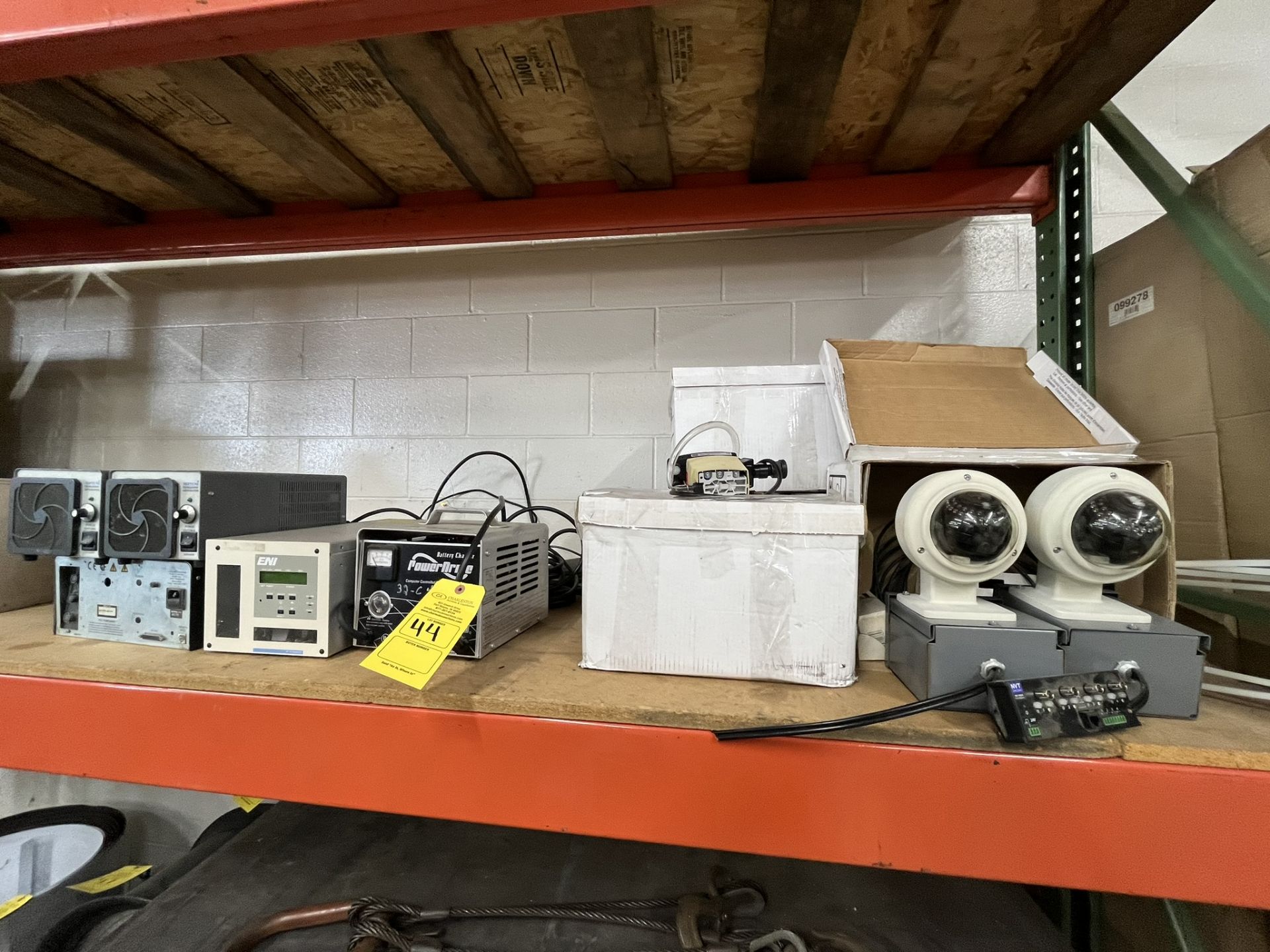 CONTENTS OF RACK: (2) NEPTUNE ULTRASONIC GENERATORS; ENI RF GENERATOR; POWER DRIVE BATTERY