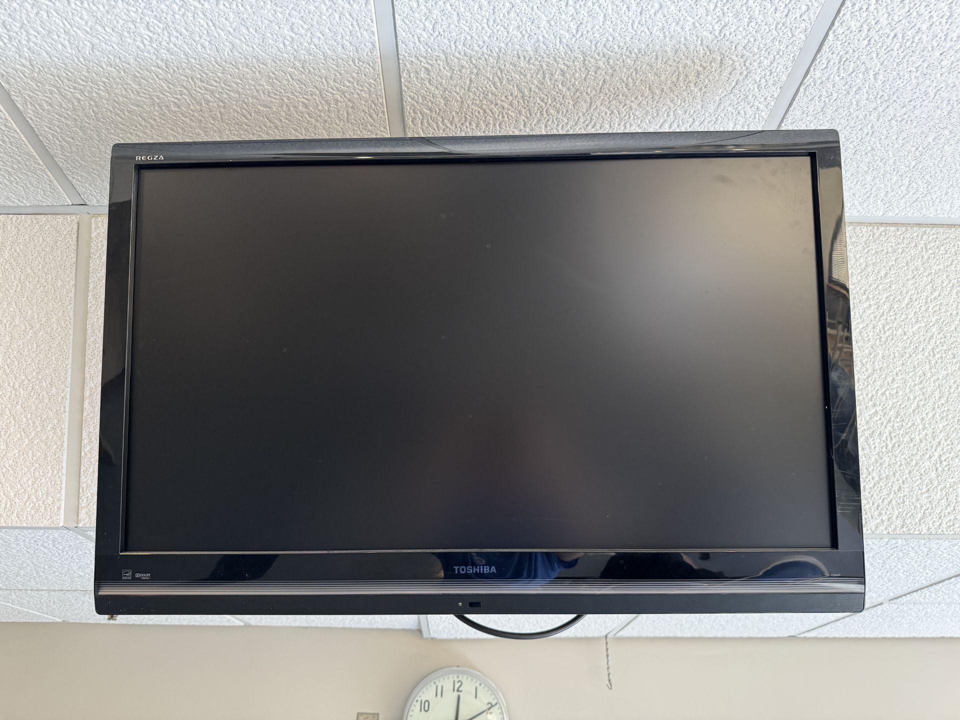 MOUNTED 42" TOSHIBA TV - NEEDS DISMOUNTED (ZONE 3)