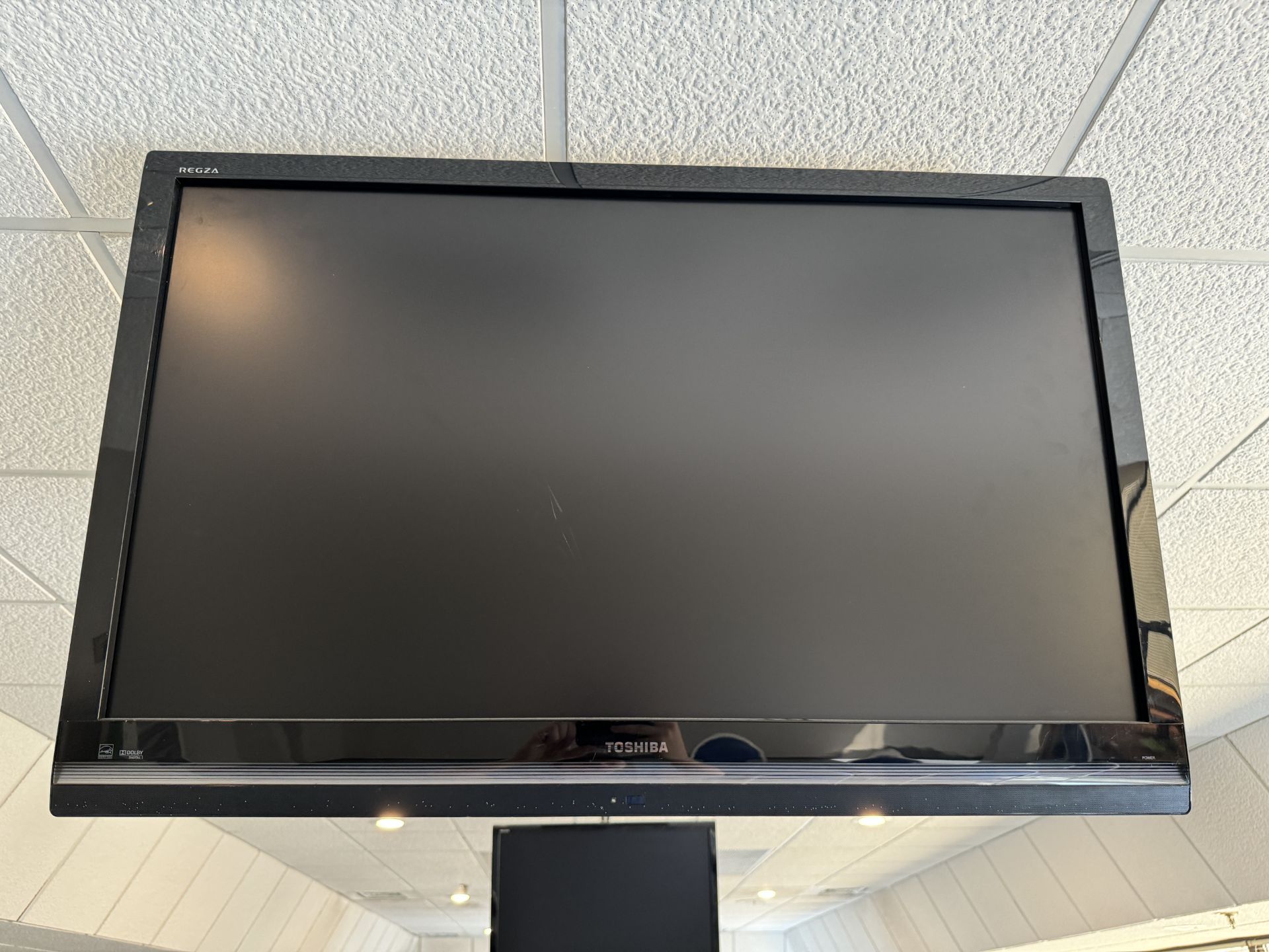 MOUNTED 42" TOSHIBA TV - NEEDS DISMOUNTED (ZONE 3)