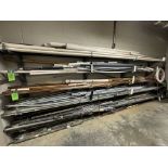 CONTENTS OF RACK: COPPER PIPING; CONDUIT; PVC; MOUNTING POST (ZONE 5)