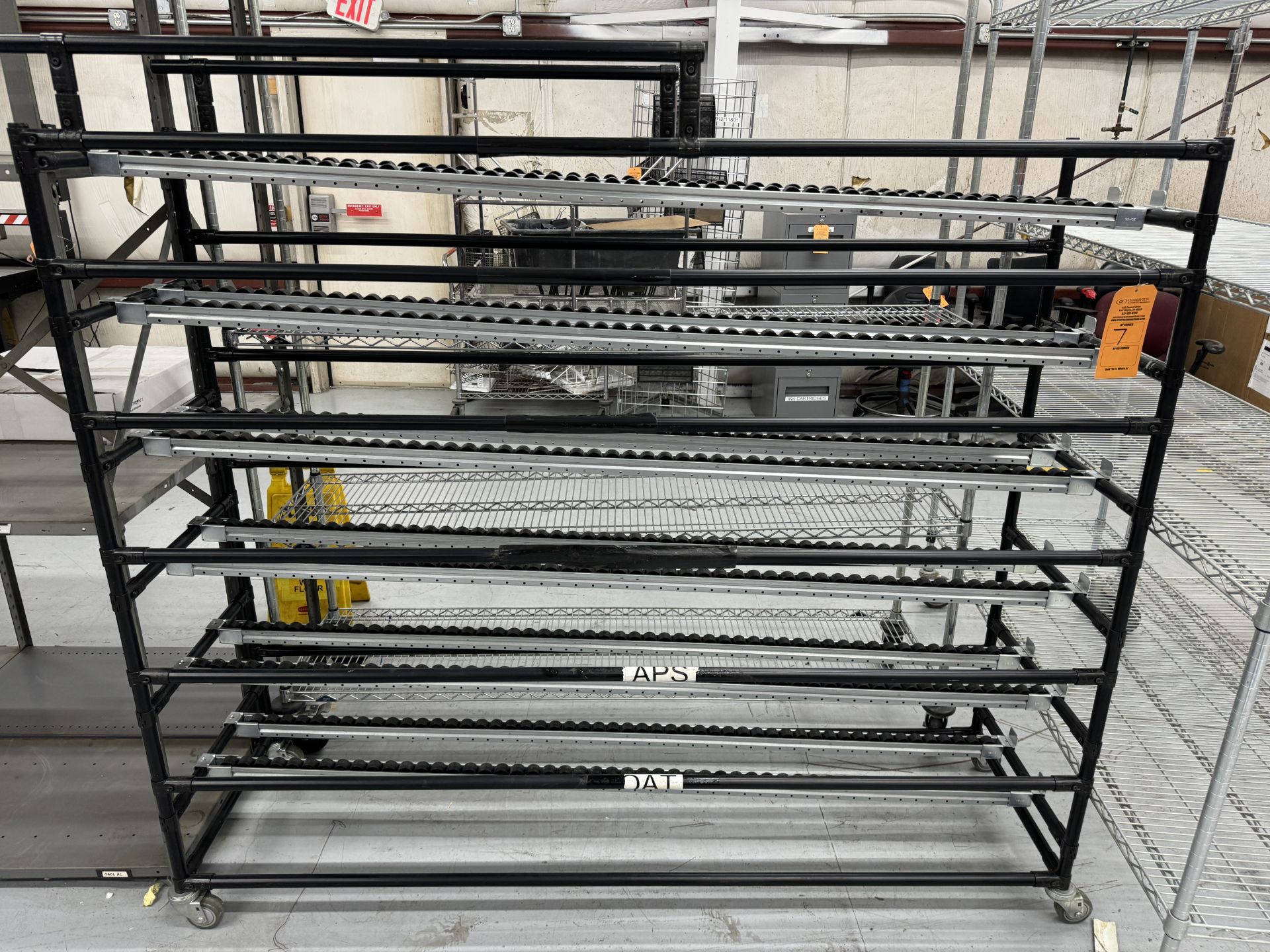 (1) GRAVITY FEED CART; (1) WIRE CART ON CASTERS