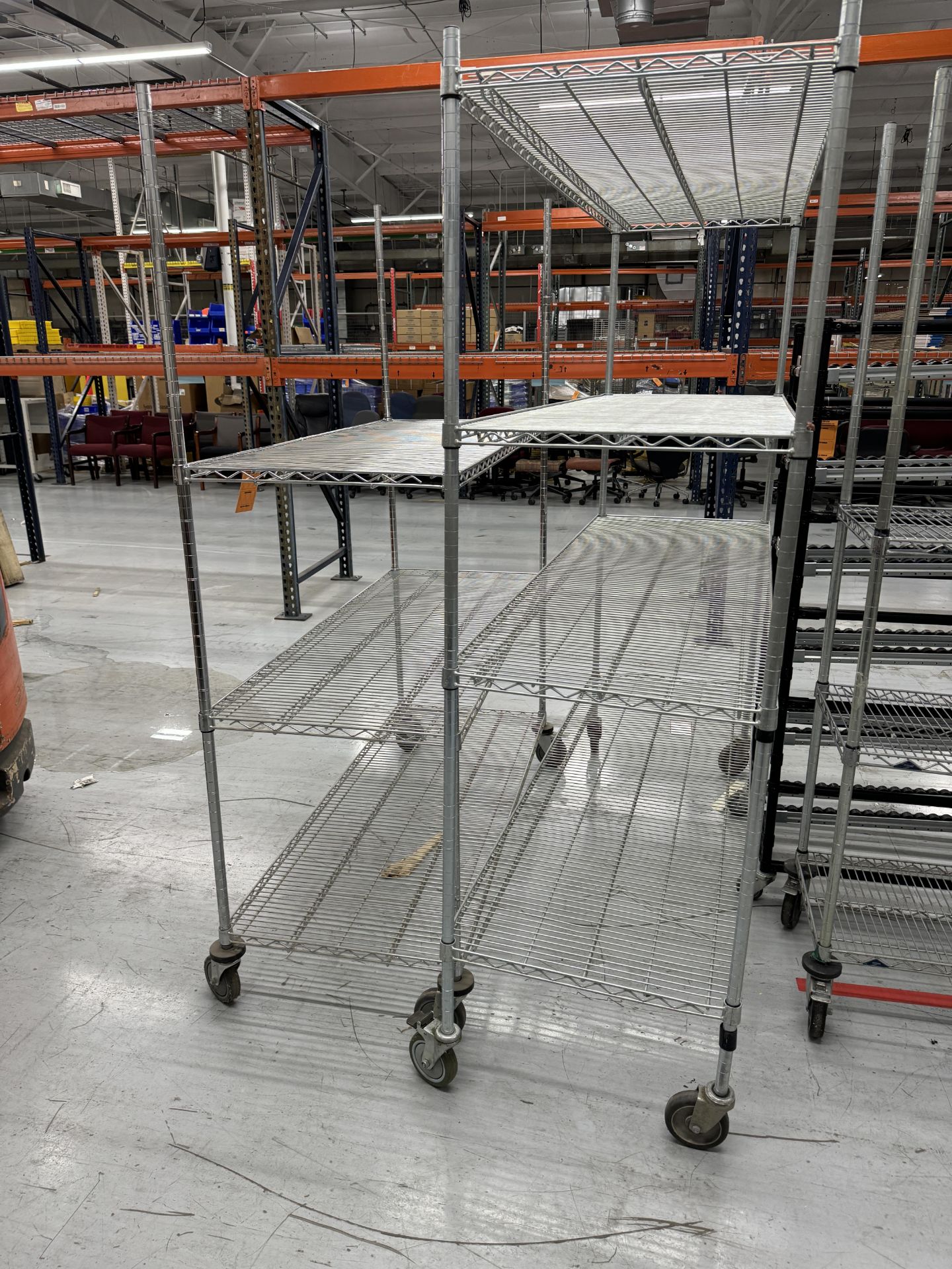 (2) WIRE RACKS ON CASTERS