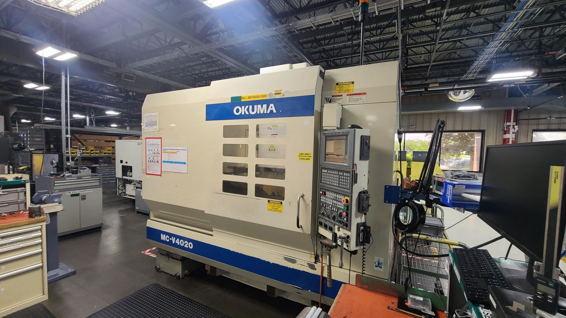 OKUMA MC-V4020 VERTICAL MACHINING CENTER; TABLE SIZE: 48X20; MAX LOAD: 1500 LB; SPINDLE TO TABLE: