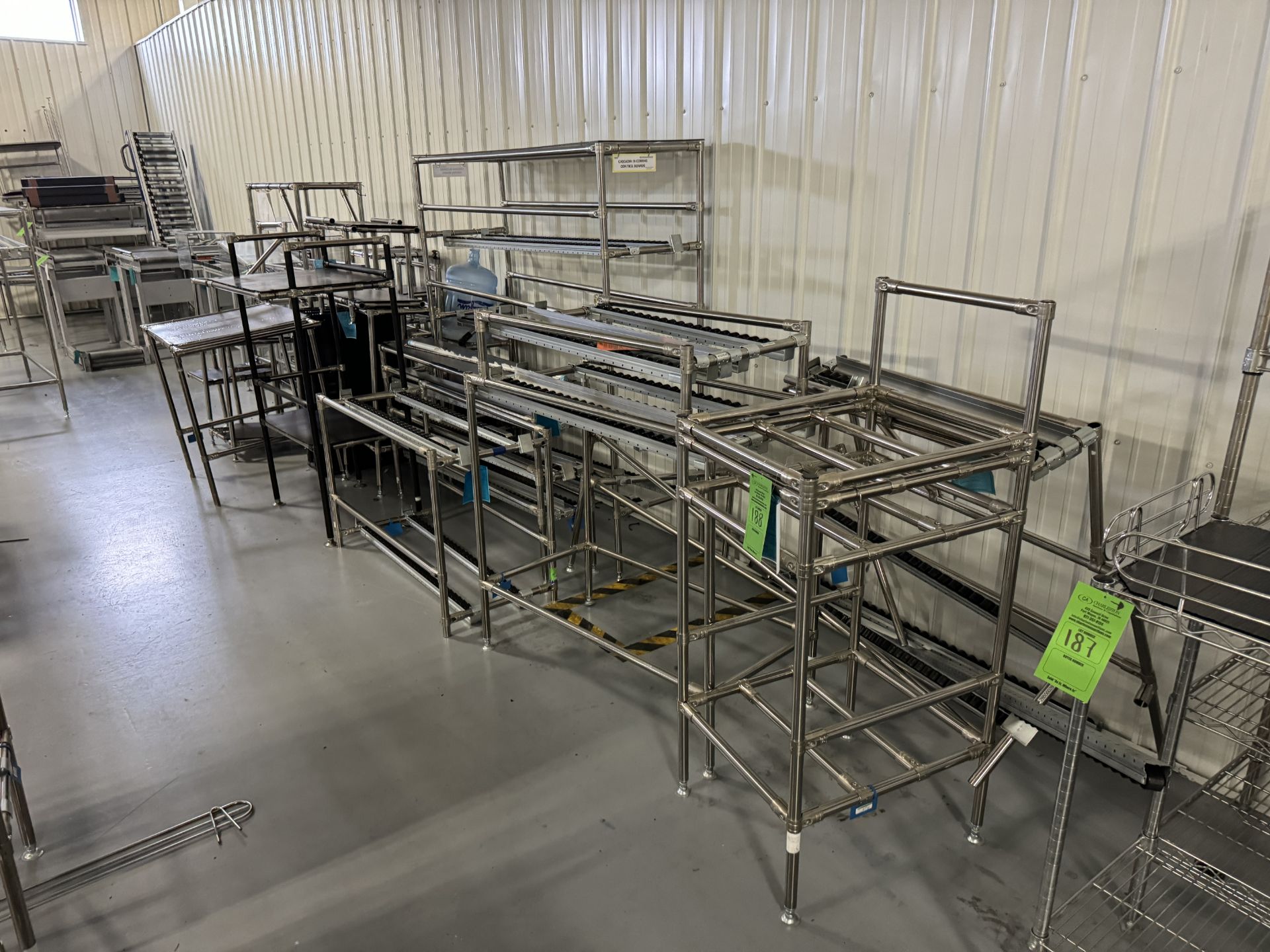 ROW OF VARIOUS CREE FORM RACKS AND CONVEYORS