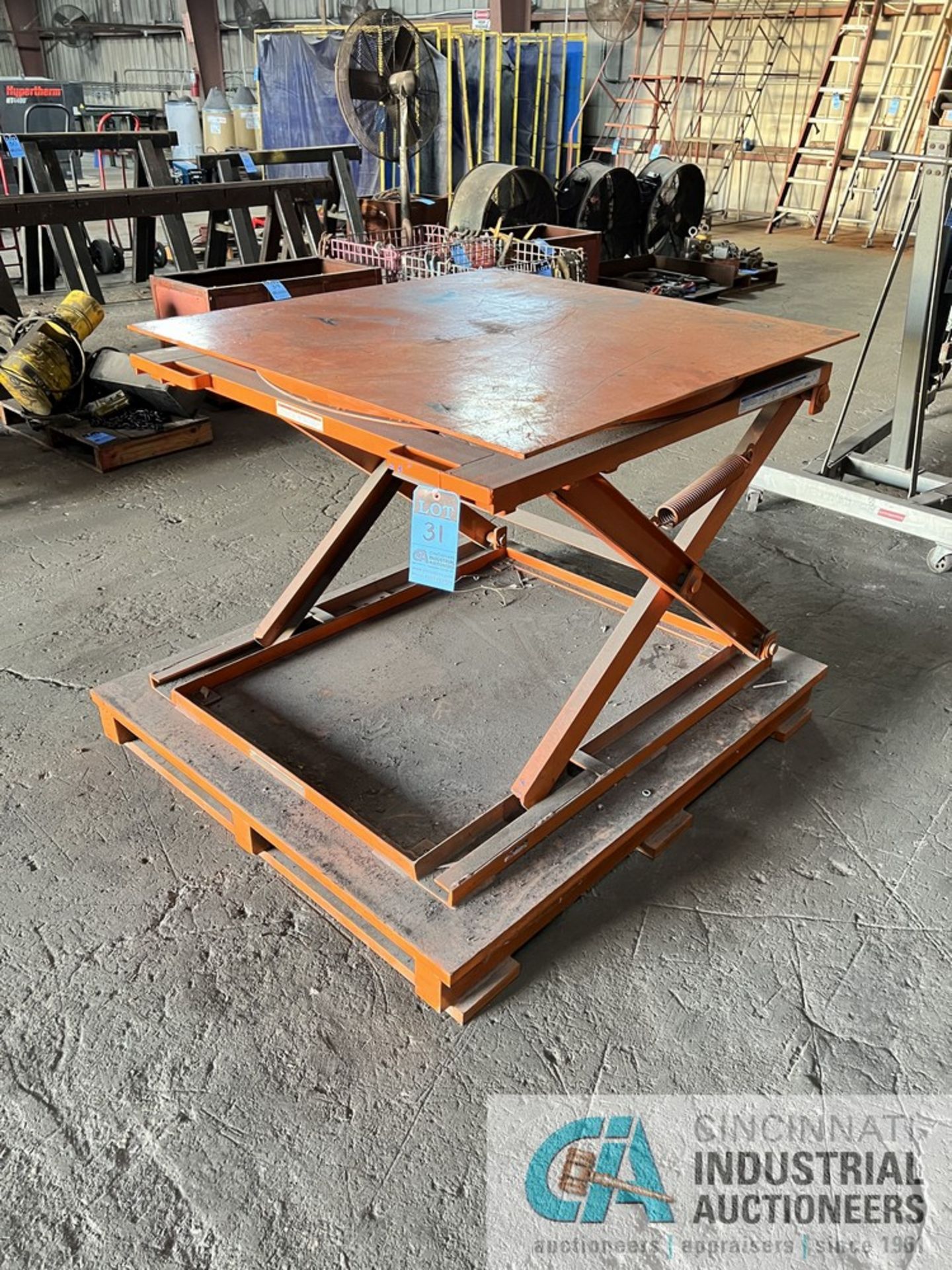 42" X 44" PLATFORM CAP AND MFG UNKNOWN ROTARY SPRING SCISSOR MATERIAL LIFT TABLE **WELDED TO STEEL