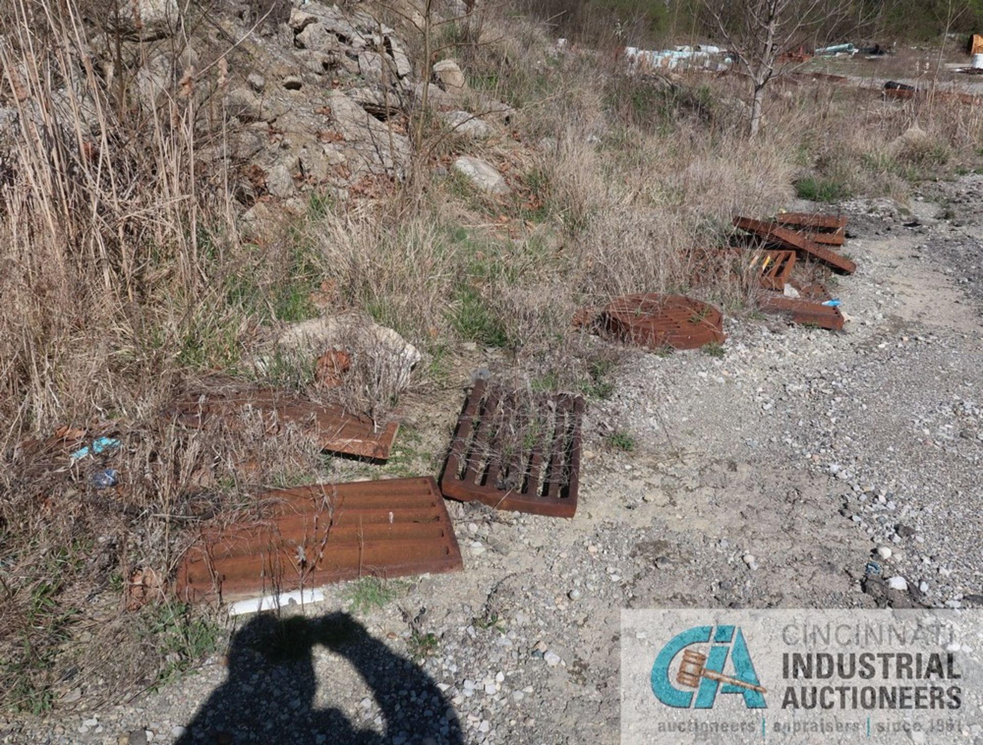 (LOT) MISCELLANEOUS CURB DRAINS, GRATES, MANHOLE COVERS ALONG ROADWAY TO PVC PIPE AREA **LOCATED - Image 6 of 13