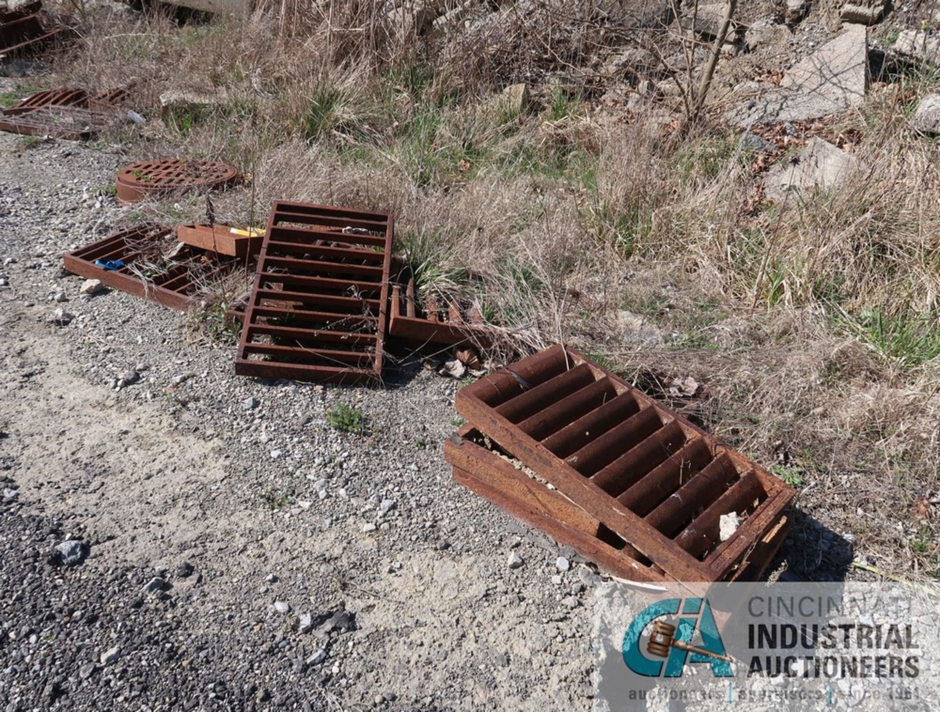 (LOT) MISCELLANEOUS CURB DRAINS, GRATES, MANHOLE COVERS ALONG ROADWAY TO PVC PIPE AREA **LOCATED - Image 7 of 13